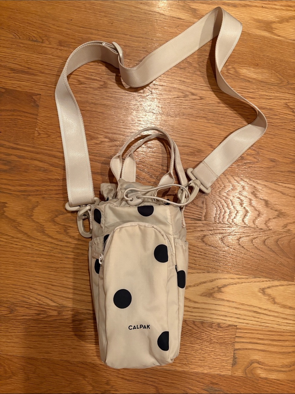 Calpak Dot Water Bottle Cross Body Bag